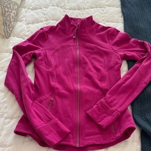 Lululemon Athletica Fuchsia zip up jacket. Good condition. Zippers work.